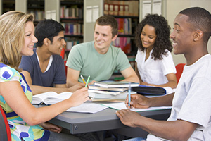 young adults studying the bible